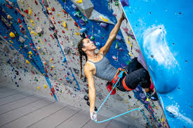 Woman lead climbing